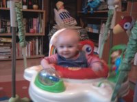 Tegan in her jumperoo.jpg