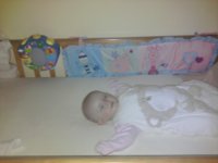 Tegan asleep in her cot.jpg